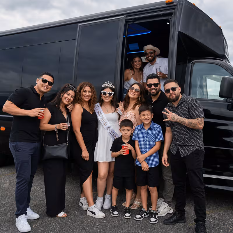 Party bus interior with wraparound leather seating and LED lighting in Garden Grove